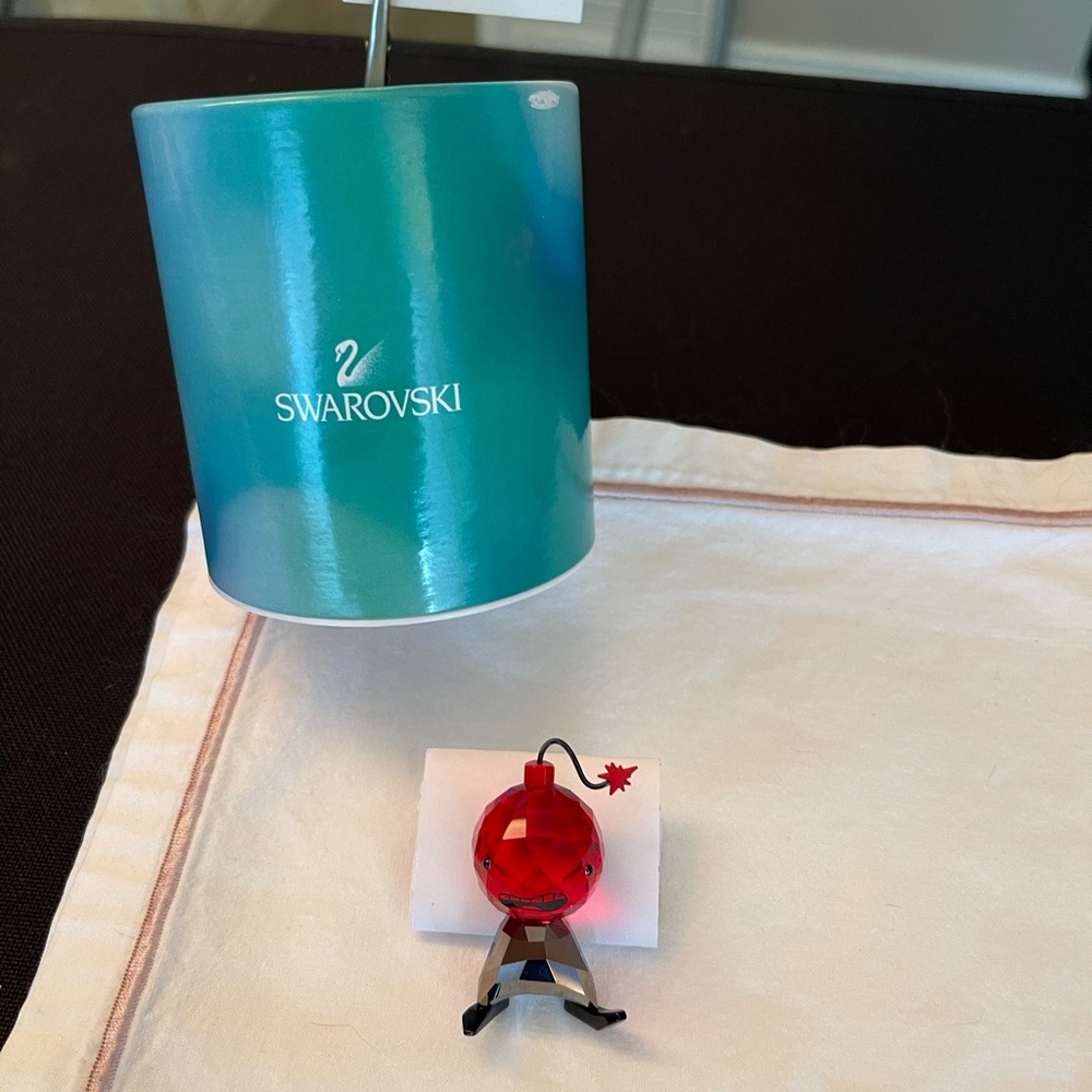 NWT - Swarovski “Pressure” Crystal Figurine. $50.